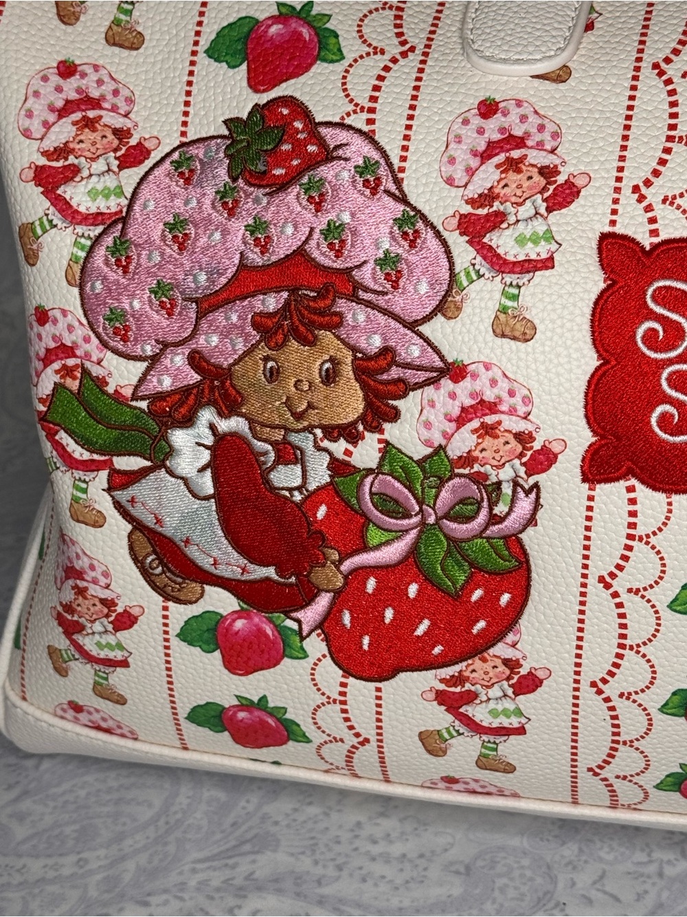 Strawberry Shortcake Pebbled Faux Leather Embroidered Red & Cream Large Duffle - Picture 3 of 14